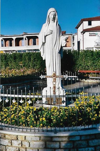 medj our lady in front of church